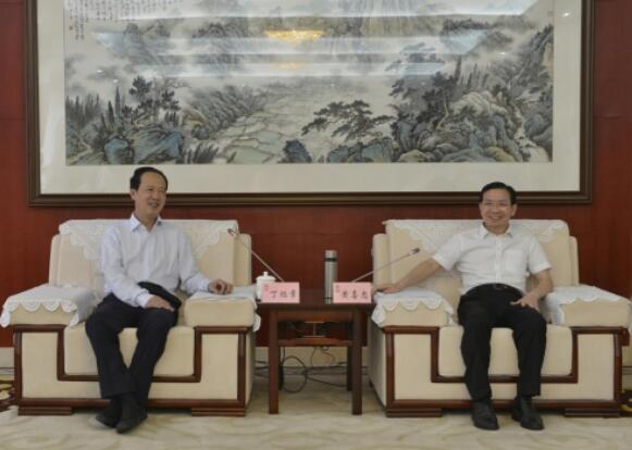 丁焰章拜會南昌市委副書記、市長黃喜忠